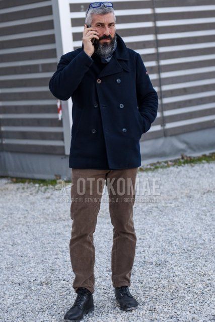 Men's winter/autumn coordinate and outfit with plain navy P-coat, plain gray turtleneck knit, solid beige winter pants (corduroy,velour), and black work boots.