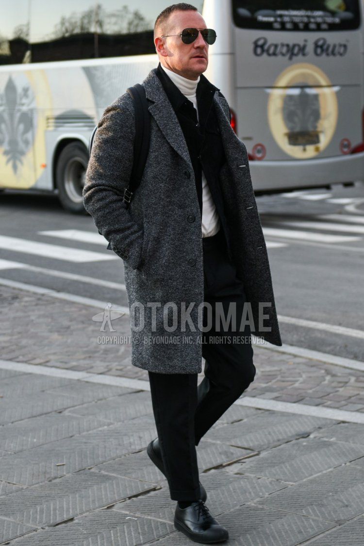Winter men's coordinate and outfit with teardrop solid black sunglasses, solid gray chester coat, solid black shirt jacket, solid white turtleneck knit, solid gray slacks, solid black socks, and black leather shoes.