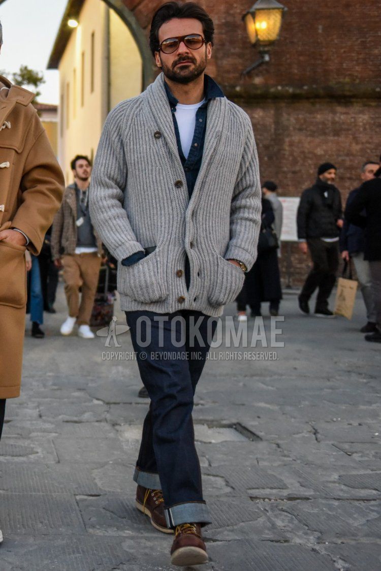Men's fall/winter coordinate and outfit with brown tortoiseshell sunglasses, solid gray cardigan, solid blue denim/chambray shirt, solid white t-shirt, solid navy denim/jeans, and brown work boots.