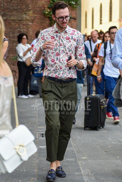 Men's spring/summer outfit with plain black glasses, white top/inner shirt, Gucci plain black leather belt, olive green plain cropped pants, plain chinos, plain pleated pants, Gucci black bit loafer leather shoes.