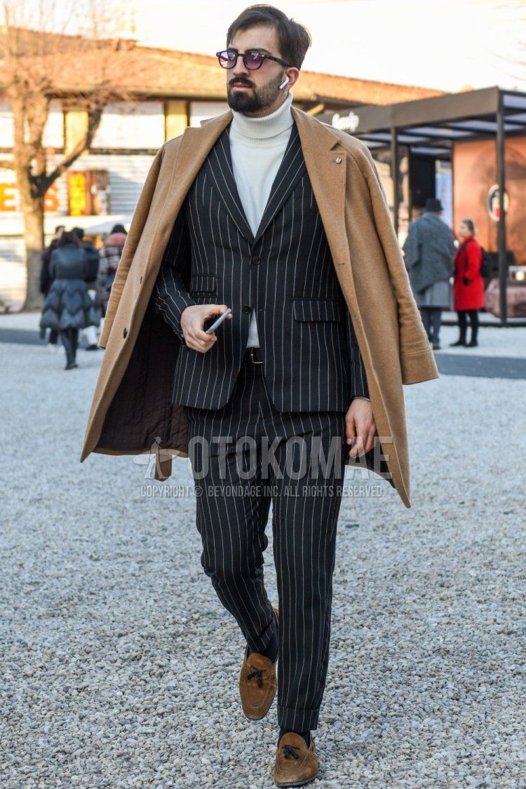 Men's fall/winter coordinate and outfit with Boston plain black sunglasses, plain beige chester coat, plain white turtleneck knit, plain black socks, suede brown tassel loafer leather shoes, and dark gray striped suit.