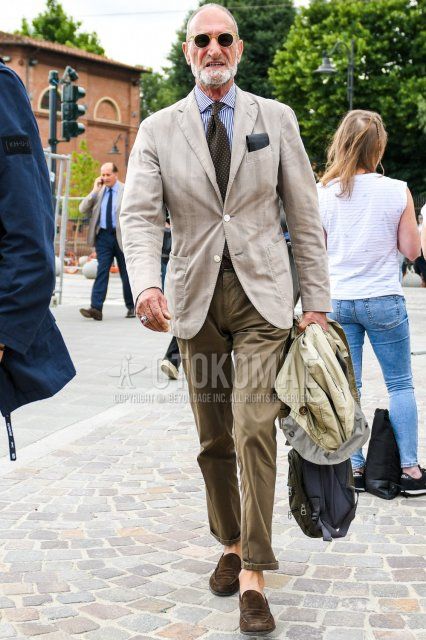 Men's spring, summer, and fall coordinate and outfit with plain sunglasses, plain beige tailored jacket, white and blue striped shirt, plain beige ankle pants, plain chinos, beige coin loafer leather shoes, and suede shoe leather shoes.
