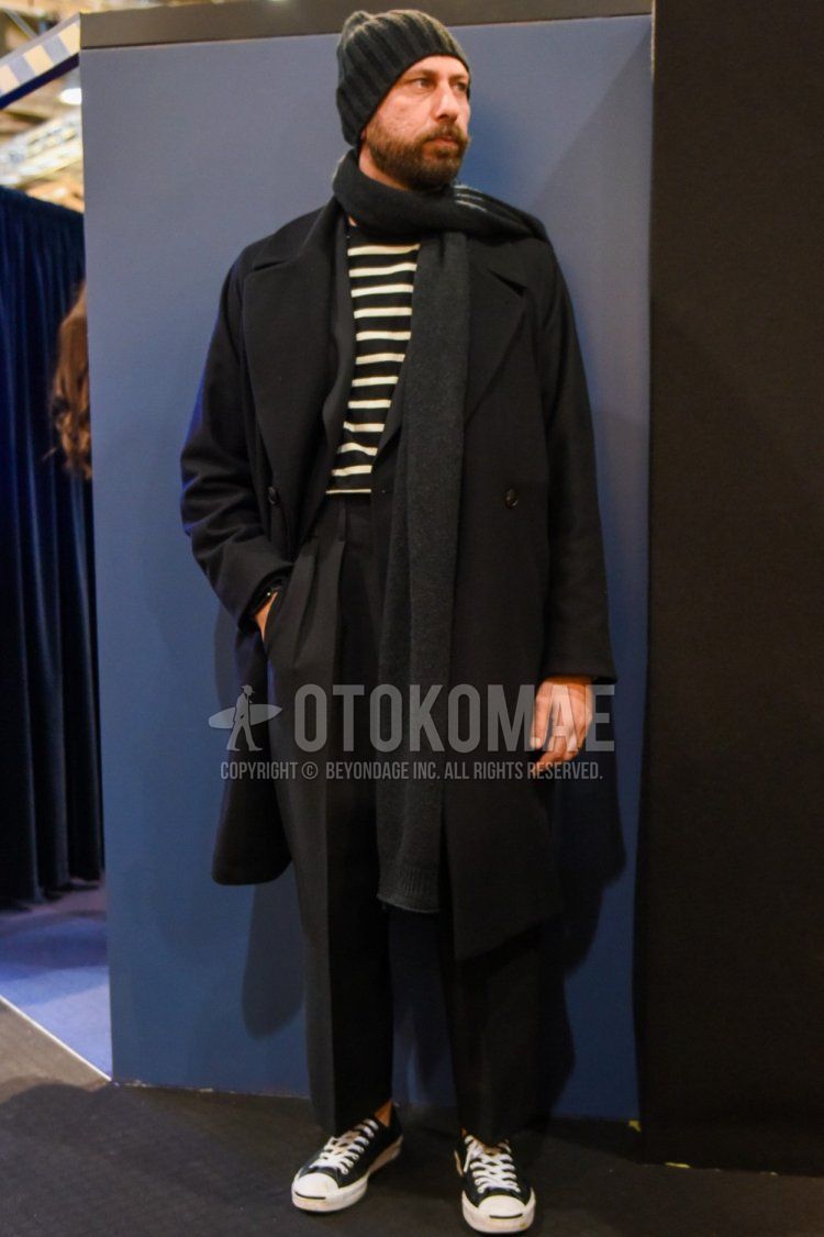 Solid black knit cap, solid gray scarf/stall, solid black Ulster coat, black/white striped long T, solid dark gray slacks, solid dark gray pleated pants, solid dark gray ankle pants, Converse Jack Purcell black low cut sneakers. Men's fall/winter outfits and outfits.