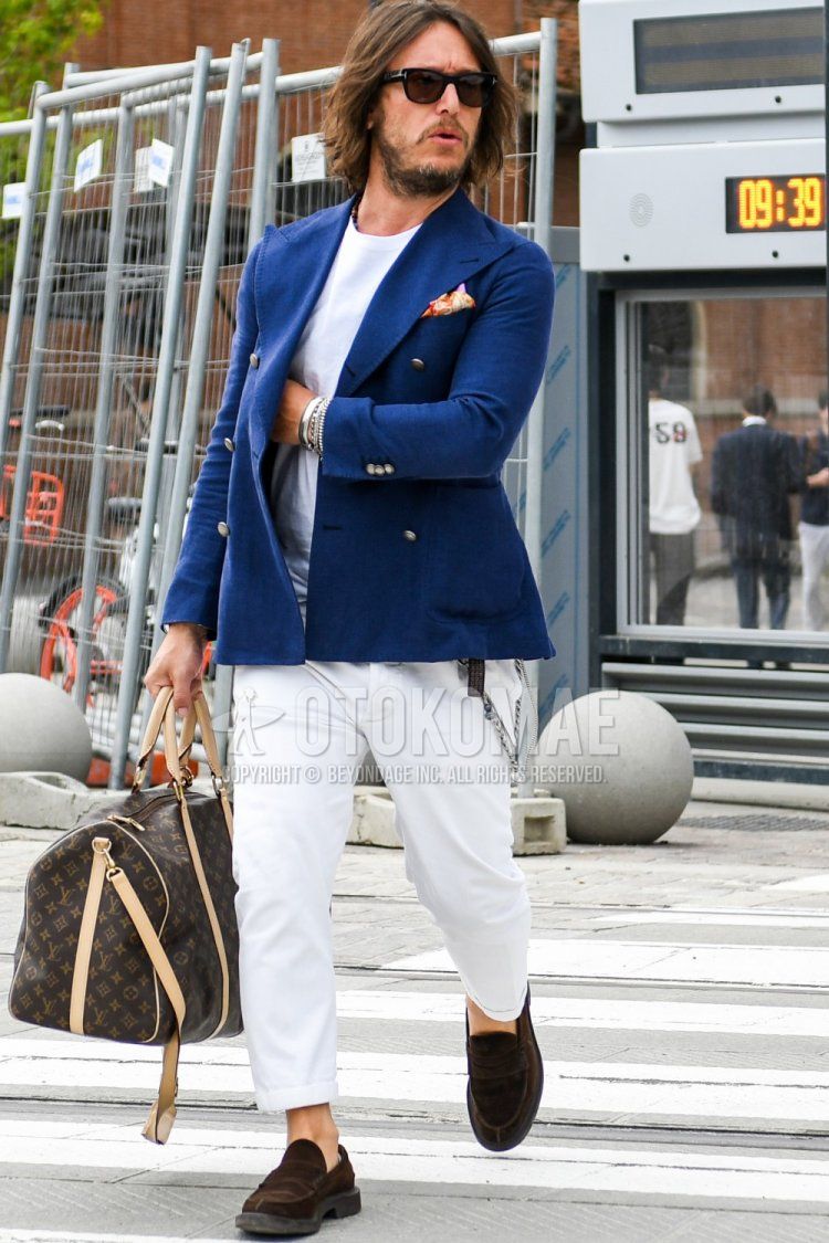 Men's spring/summer/fall outfit with plain sunglasses, plain navy tailored jacket, plain white t-shirt, plain white cotton pants, brown coin loafers leather shoes, brown suede shoes leather shoes, plain brown briefcase/handbag by Vuitton.