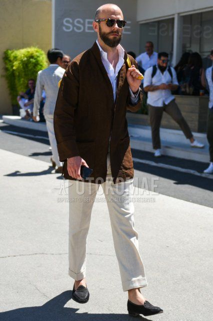 Men's spring, summer, and fall coordinate and outfit with black tortoiseshell sunglasses, plain brown outerwear, plain white shirt, plain white slacks, and suede black loafer leather shoes.