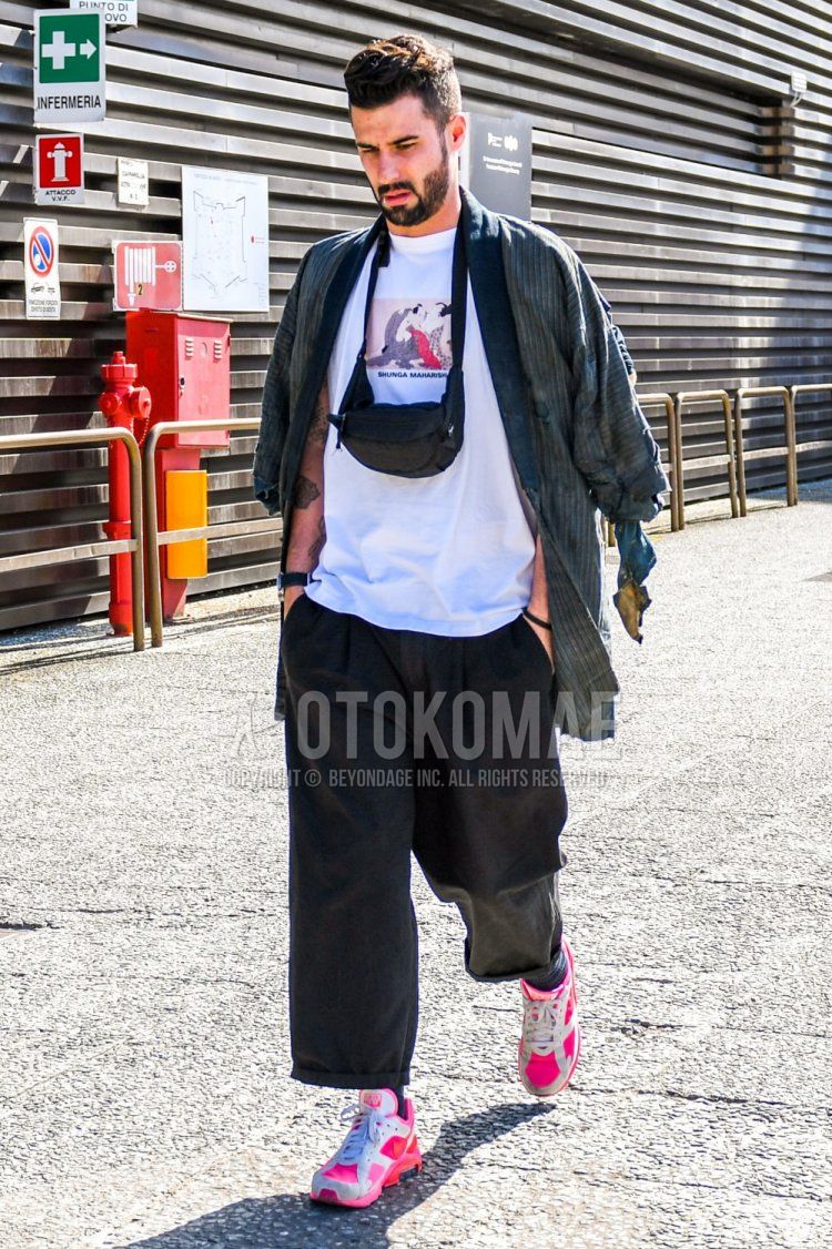 Men's spring, summer, and fall coordinate and outfit with gray striped outerwear, maharishi shunga white graphic t-shirt, plain black wide leg pants, socks, Nike Comme des Garcons Air Max 180 white/pink low-cut sneakers, and plain black body bag.