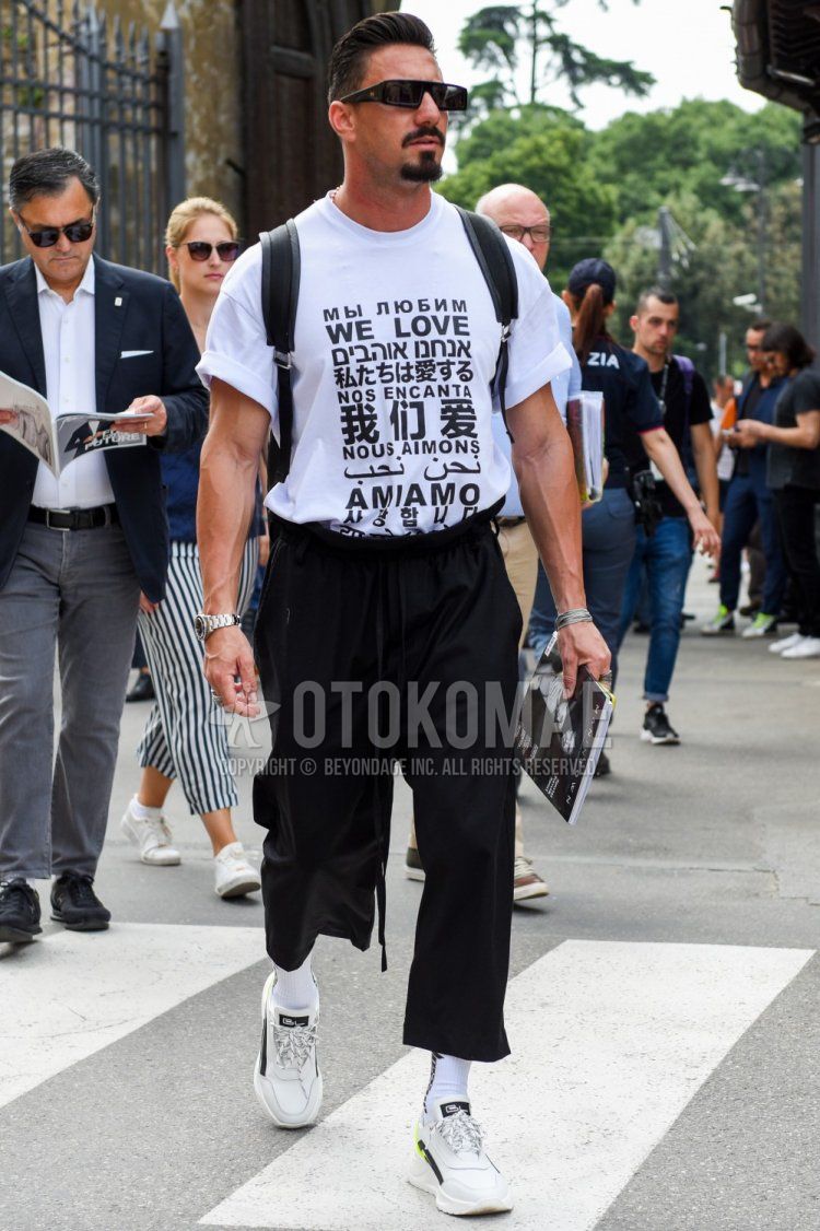 Summer men's coordinate and outfit with square plain black sunglasses, white top/inner t-shirt, plain black cropped pants, plain black easy pants, plain white socks, and white low-cut sneakers.
