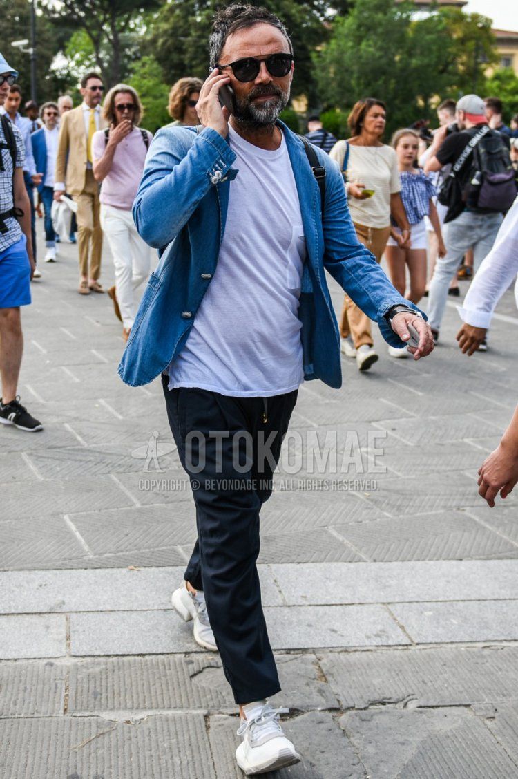 Spring and fall men's coordinate and outfit with plain black sunglasses, plain blue tailored jacket, plain denim jacket, plain white t-shirt, plain navy easy pants, plain chinos, and white low-cut sneakers.