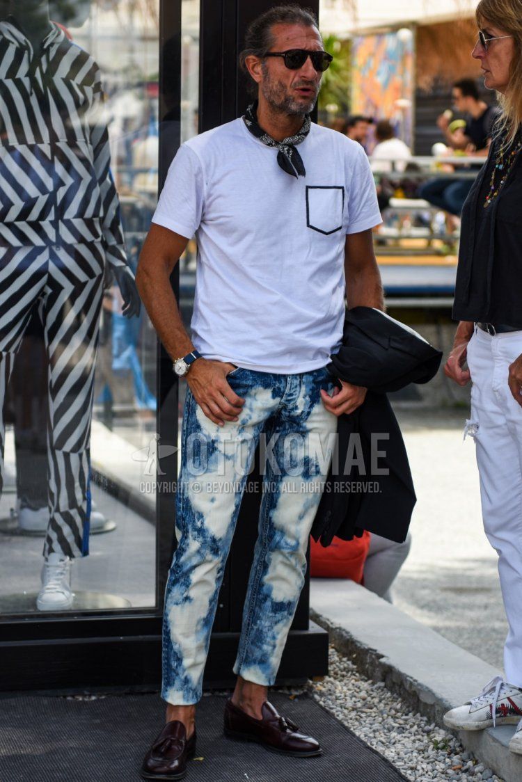 Summer men's coordinate and outfit with plain black sunglasses, black stole bandana/neckerchief, plain white t-shirt, blue bottoms denisla, brown tassel loafer leather shoes.