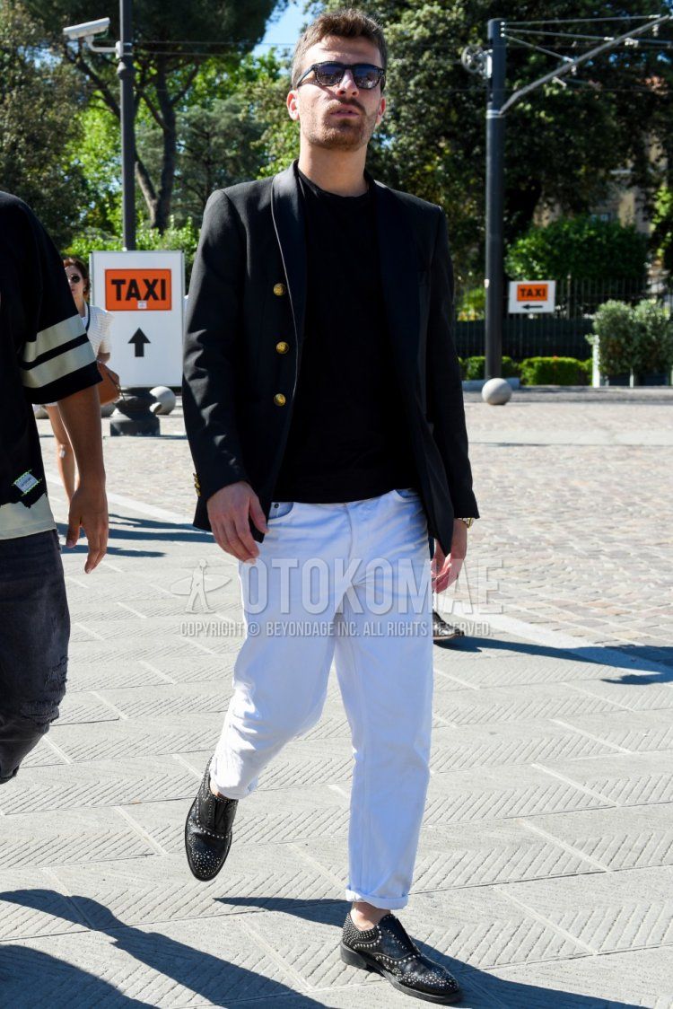 Men's spring/summer coordinate and outfit with black eyewear sunglasses, plain black tailored jacket, plain black t-shirt, plain white denim/jeans, and black leather shoes.