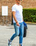 A summer men's coordinate and outfit with plain sunglasses, plain white t-shirt, plain blue denim/jeans, and navy low-cut sneakers.