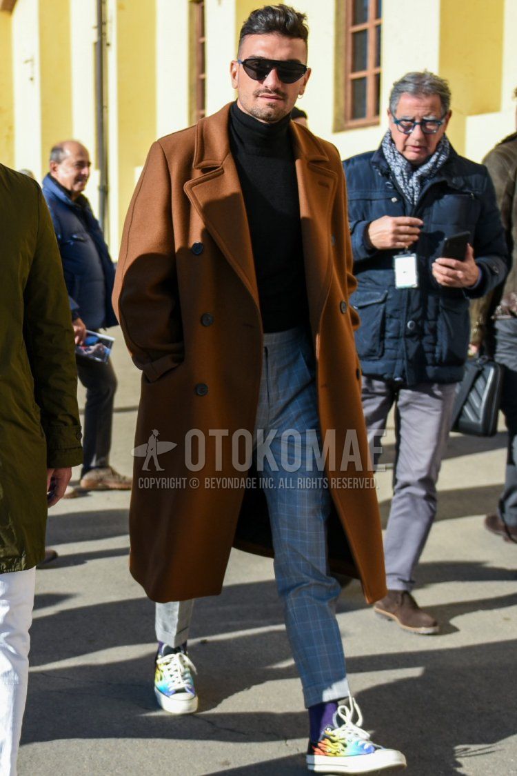 Men's fall/winter coordinate and outfit with solid black sunglasses, solid brown chester coat, solid black turtleneck knit, gray checked slacks, gray checked cropped pants, solid purple socks, and Converse multi-colored low-cut sneakers.