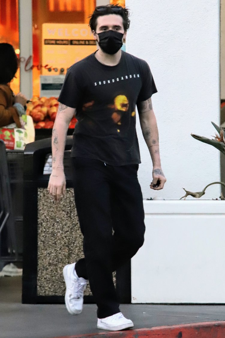 EXCLUSIVE: Brooklyn Beckham continues to fuel speculation he has secretly married fiancee Nicola Peltz as he is seen in LA with what appears to be a wedding ring