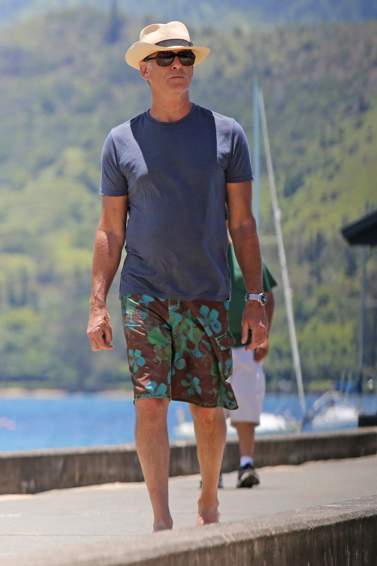 EXCLUSIVE: Pierce Brosnan watches as his son jumps off a pier in Hawaii
