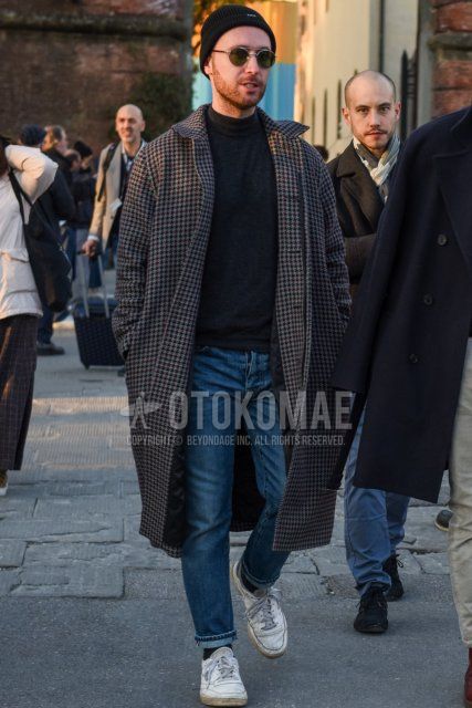 Men's fall/winter coordinate/outfit with solid black knit cap, solid gold sunglasses, gray checked stainless steel stainless steel coat, solid gray turtleneck knit, solid blue denim/jeans, solid black socks, and Reebok white low-cut sneakers.