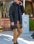 Men's fall/winter outfit with plain black sunglasses from Boston, plain gray hooded coat, plain gray inner down, plain beige chinos, plain black socks, and New Balance olive green low-cut sneakers.