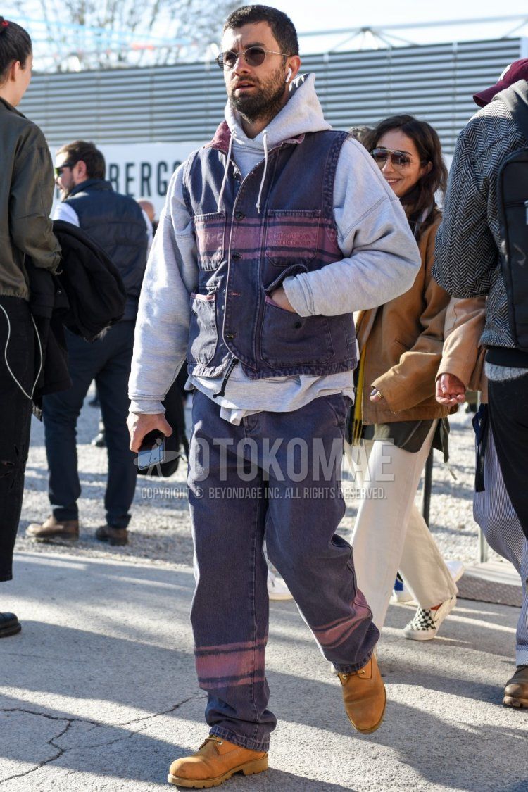 Men's spring and autumn coordinate and outfit with plain silver sunglasses, plain gray hoodie, beige Timberland boots, and plain gray casual setup.