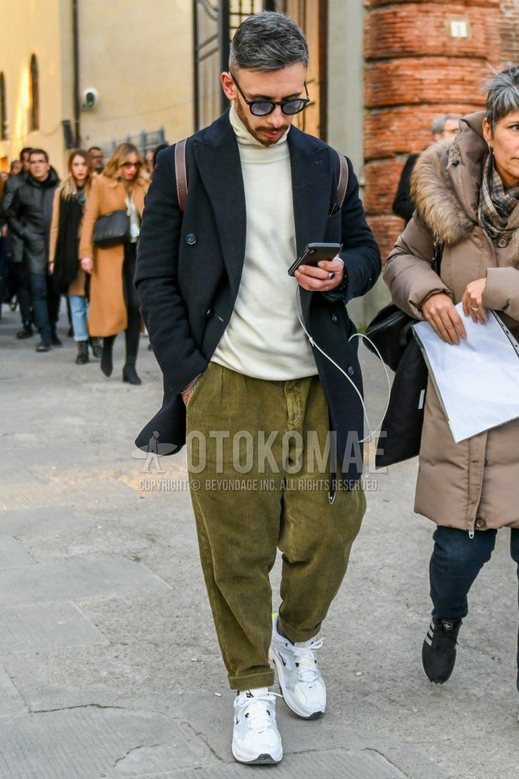 Men's fall/winter coordinate and outfit with plain black glasses, plain black chester coat, plain white turtleneck knit, plain olive green winter pants (corduroy,velour) and Nike M2K Techno white low-cut sneakers.