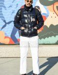Men's fall/winter coordinate and outfit with solid beige sunglasses, solid navy down jacket, dark gray solid turtleneck knit, solid white cotton pants, solid white wide-leg pants, solid black socks, and brown monk shoe leather shoes.