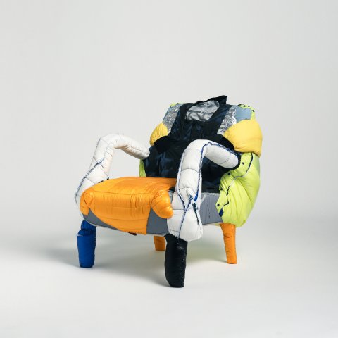 The theme is " People Turned into Chairs." A limited number of one-of-a-kind chairs made from recycled Tatras down clothing are available!