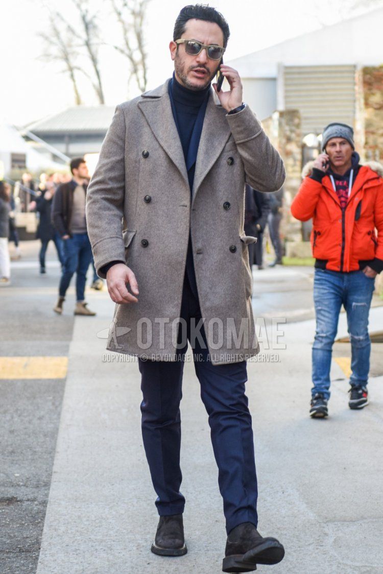 Men's fall/winter coordinate and outfit with plain beige sunglasses, plain beige Ulster coat, plain gray turtleneck knit, suede gray side gore boots, and plain gray suit.
