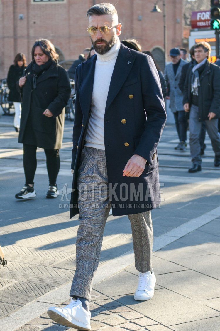 Men's fall/winter outfit with plain silver sunglasses, plain dark gray chester coat, plain white turtleneck knit, gray checked slacks, gray checked ankle pants, plain gray socks, and white low-cut sneakers.