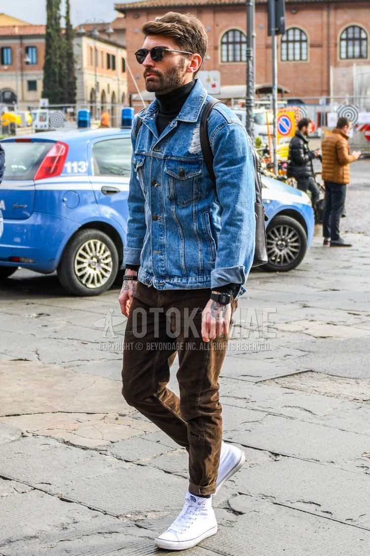 Men's fall/winter coordinate and outfit with solid color sunglasses, solid color blue denim jacket, solid color black turtleneck knit, solid color brown winter pants (corduroy,velour) and white high cut sneakers.