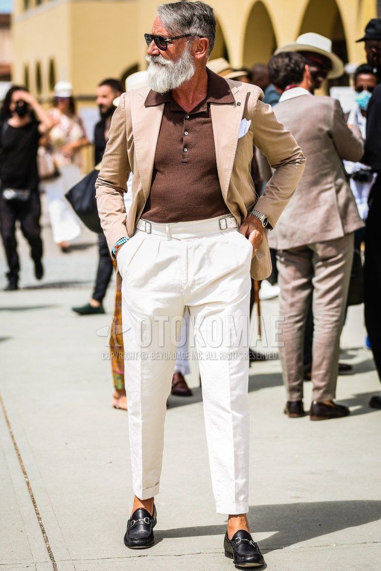 Men's spring/summer coordinate and outfit with plain black sunglasses, plain beige tailored jacket, plain brown polo shirt, plain white slacks, and black bit loafer leather shoes.