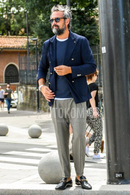 Men's spring, summer, and fall outfits and outfits with plain sunglasses, plain navy tailored jacket, plain navy t-shirt, plain white t-shirt, gray checked ankle pants, gray checked pleated pants, and black bit loafer leather shoes.
