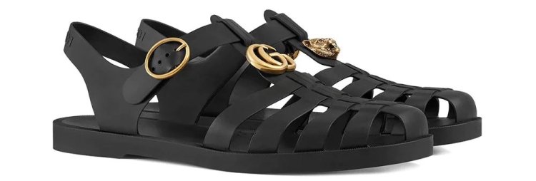 A sense of luxury you wouldn't expect from rubber! A pair of "GUCCI Rubber Buckle Strap Sandals" to wear to the resort.