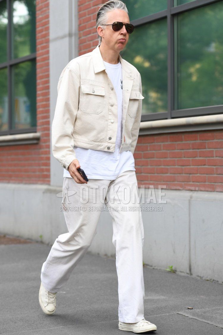 Men's spring and summer coordinate and outfit with plain black sunglasses, plain white denim jacket, white one-pointed T-shirt, plain white cotton pants, and white sneakers.