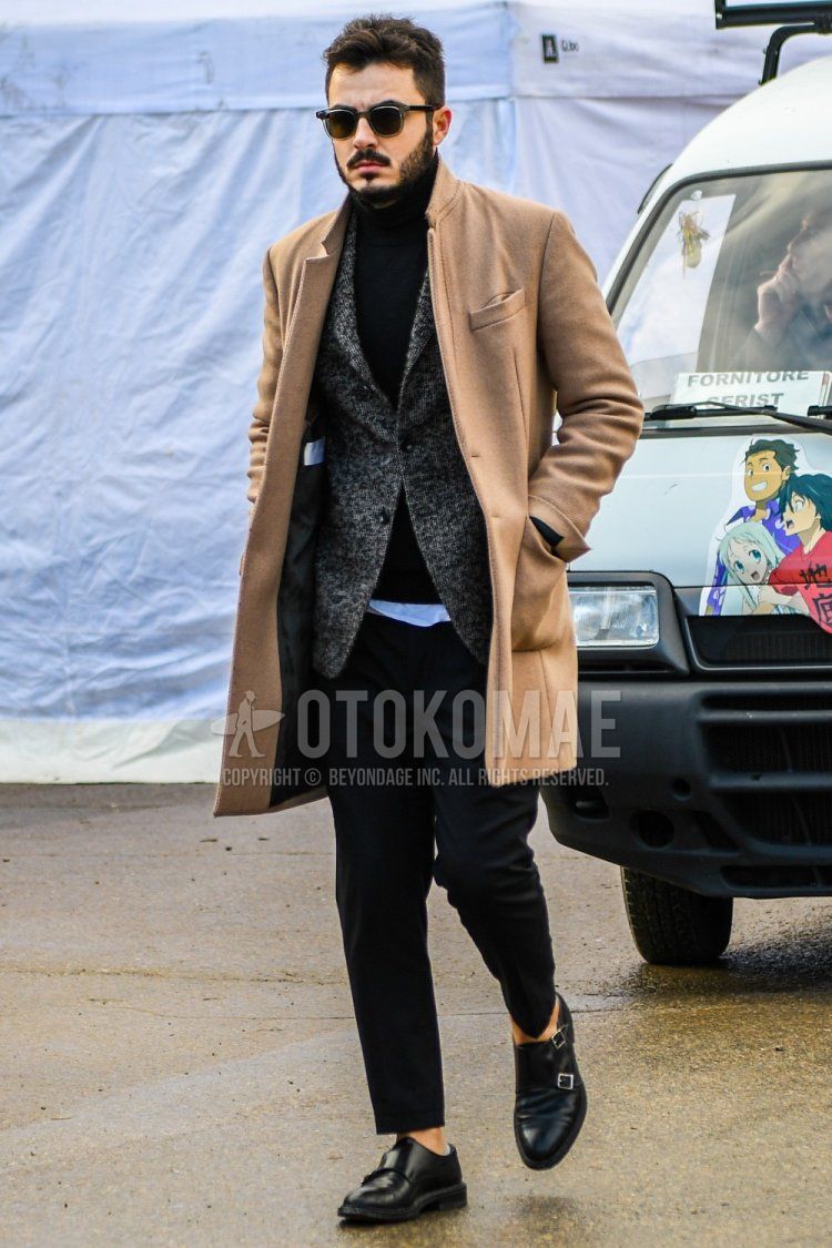 Men's fall/winter coordinate and outfit with solid color sunglasses, solid color beige chester coat, solid color gray tailored jacket, solid color black turtleneck knit, solid color black slacks, black monk shoes leather shoes.