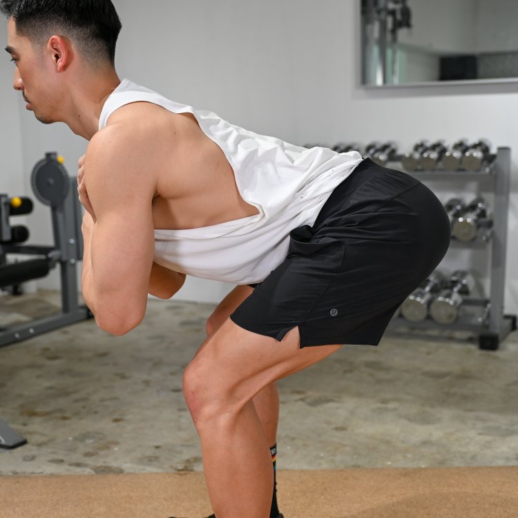 Common Squatting Mistake #4: "Lower back bends too far."