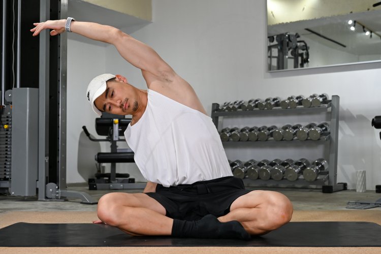 Seated side bends," a stretch for the side of the body