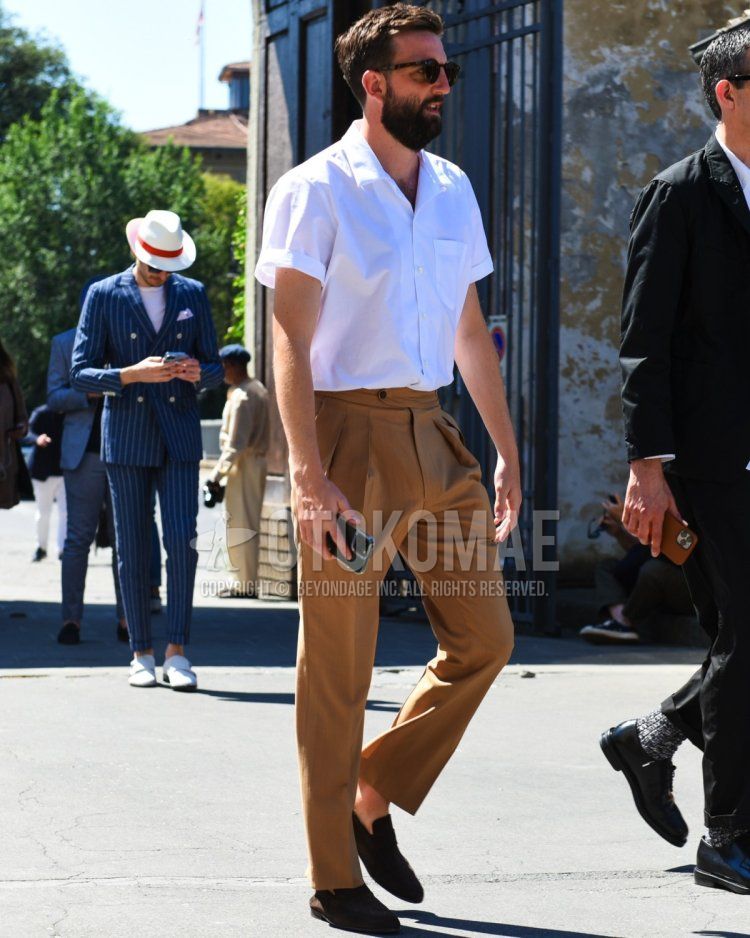 Summer/spring men's coordinate and outfit with brown tortoiseshell sunglasses, plain white shirt, plain brown slacks, brown coin loafers leather shoes, brown suede shoes leather shoes.