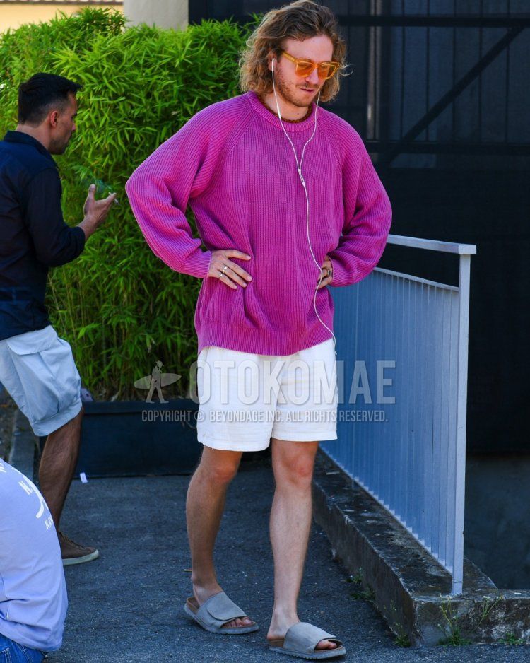 Summer/spring men's coordinate and outfit with solid orange sunglasses, solid purple sweater, solid white shorts, and Birkenstock Los Feliz gray leather sandals.
