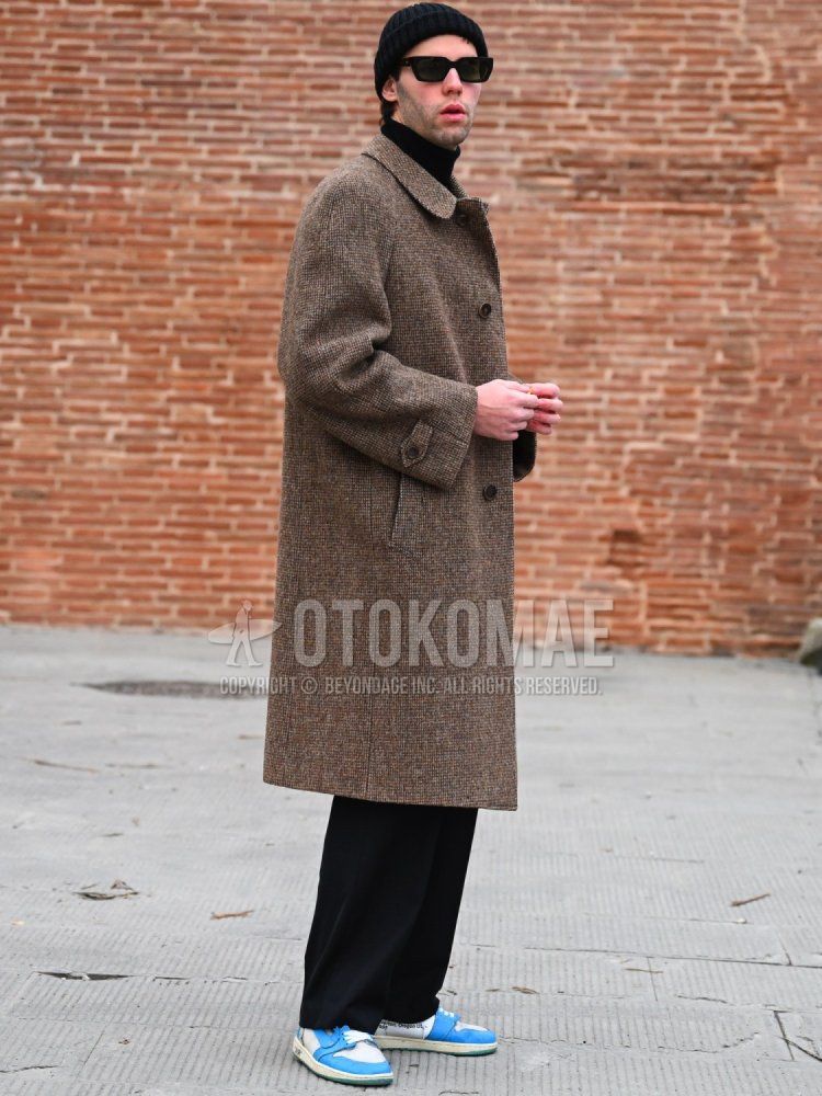 Men's winter/autumn coordinate and outfit with plain black knit cap, plain black sunglasses, brown checked stainless steel stainless steel coat, plain black turtleneck knit, plain black slacks, and Nike blue low-cut sneakers.