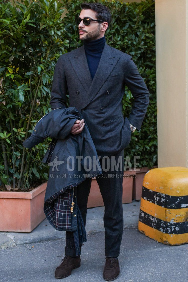 Men's spring and fall coordinate and outfit with plain black sunglasses, plain dark gray turtleneck knit, suede brown brogue shoes leather shoes, and gray checked suit.