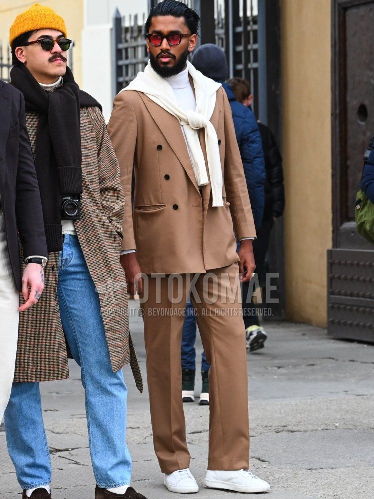 Men's fall/winter coordinate and outfit with brown tortoiseshell sunglasses, plain white turtleneck knit, plain white cardigan, white low-cut sneakers, and plain brown suit.