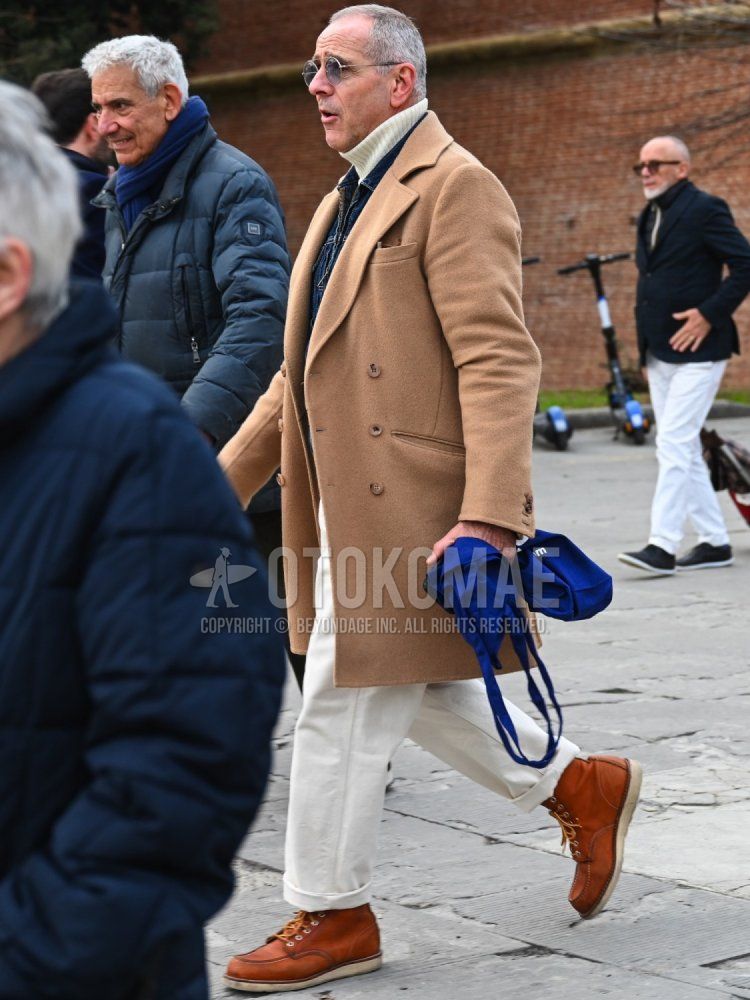 Men's fall/winter coordinate and outfit with plain silver sunglasses, plain beige chester coat, plain blue denim jacket, plain white turtleneck knit, plain white cotton pants, and brown work boots.