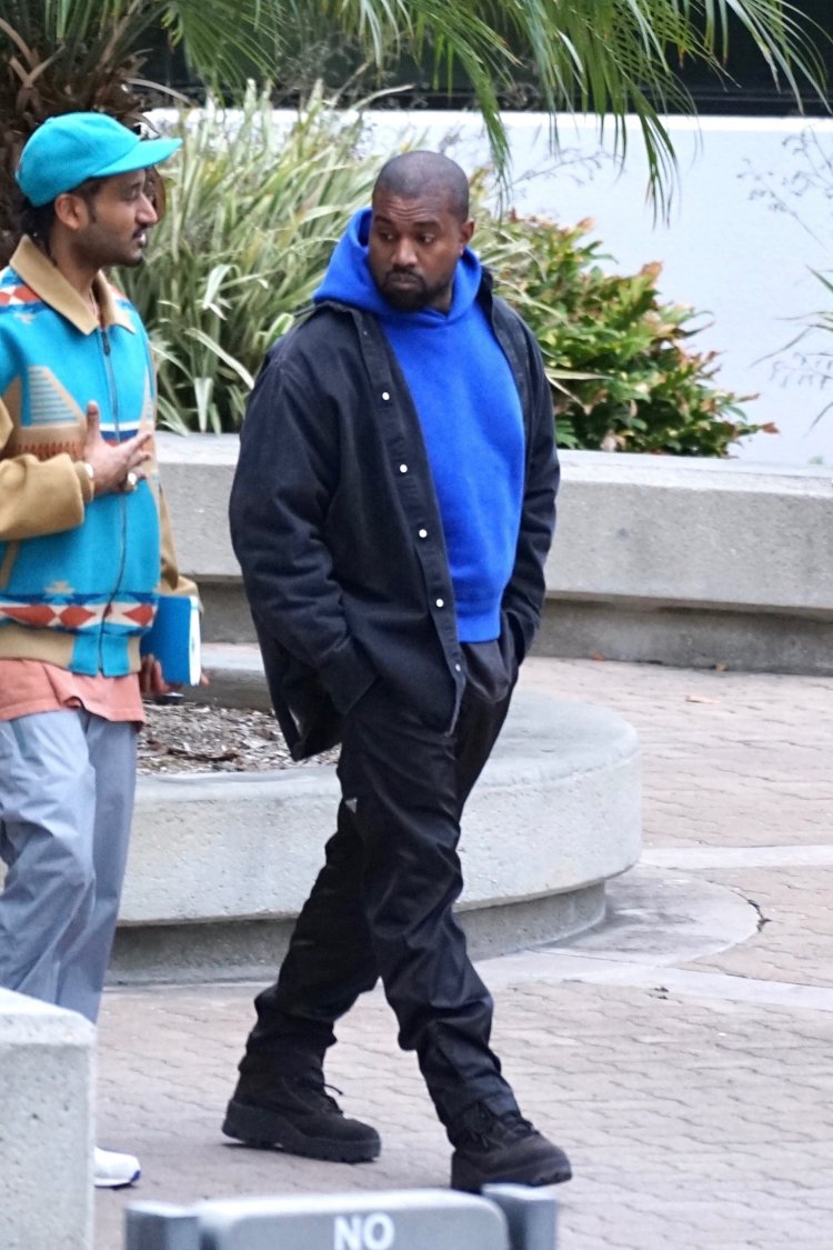 *EXCLUSIVE* Kanye West chats with a colleague as he leaves his office in Los Angeles