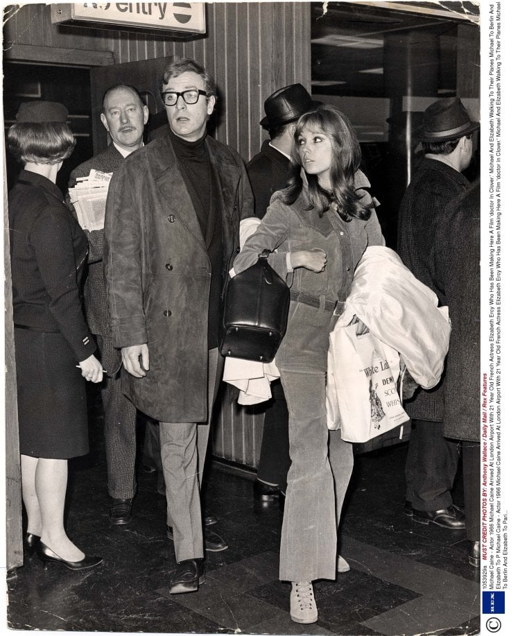 Michael Caine - Actor 1966 Michael Caine Arrived At London Airport With 21 Year Old French Actress Elizabeth Ercy Who Has Been Making Here A Film 'doctor In Clover.' Michael And Elizabeth Walking To Their Planes Michael To Berlin And Elizabeth To P