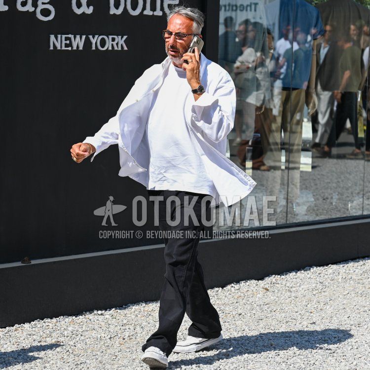 Summer/spring men's coordinate and outfit with plain black glasses, plain white shirt, plain white t-shirt, plain black slacks, plain black chinos, and white low-cut sneakers.