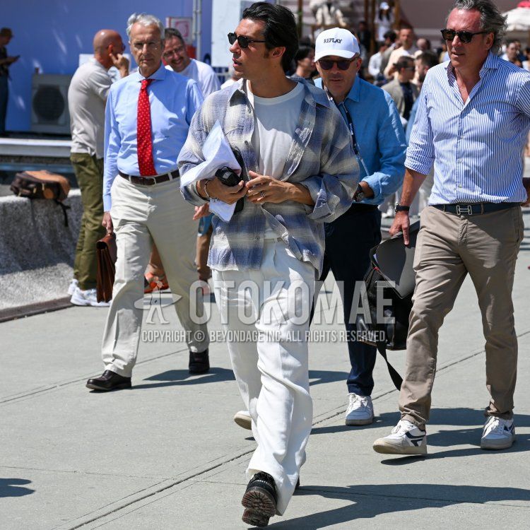 Men's spring and summer coordinate and outfit with plain black Ray-Ban sunglasses, plain blue checked shirt, plain white t-shirt, plain white slacks, plain white pleated pants, and black tassel loafer leather shoes.