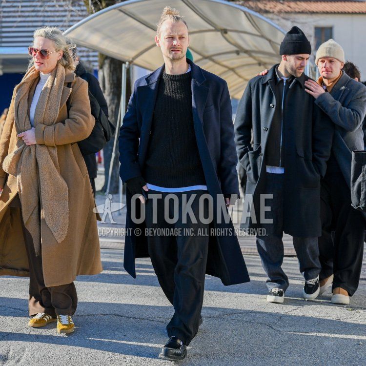 Men's fall/winter coordinate and outfit with plain navy chester coat, plain black sweater, plain white t-shirt, dark gray plain slacks, and black coin loafer leather shoes.