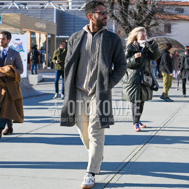 Men's winter coordinate and outfit with brown tortoiseshell sunglasses, plain gray chester coat, plain gray hoodie, plain white winter pants (corduroy,velour), and white low-cut Nike sneakers.