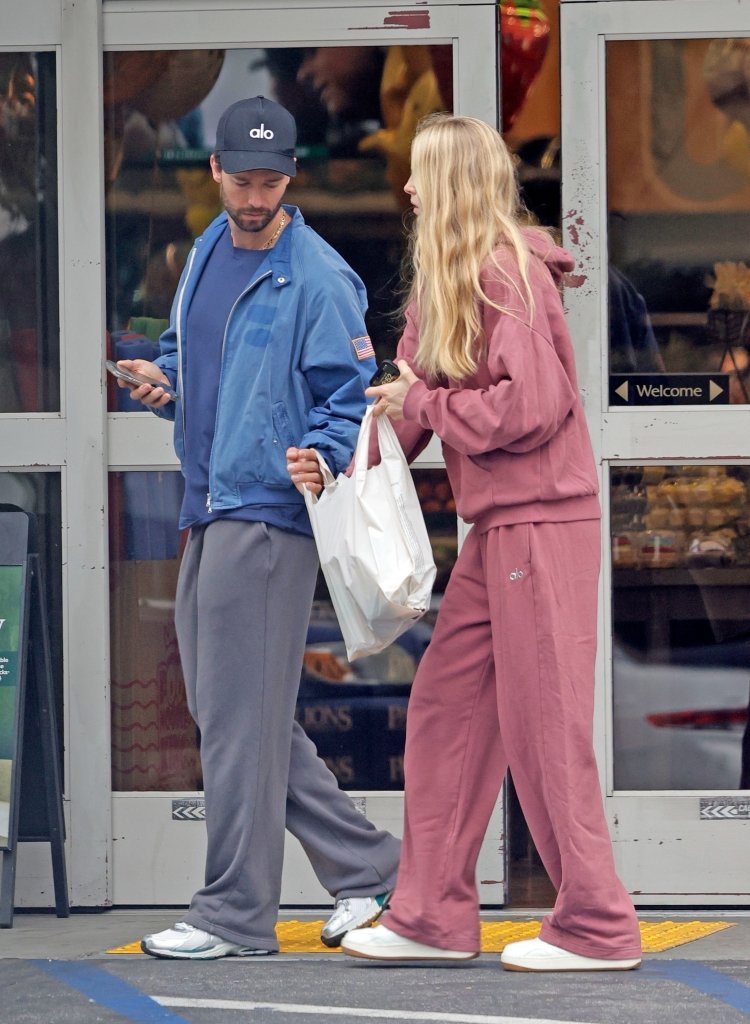 *EXCLUSIVE* Patrick Schwarzenegger Leaves the Grocery Store with Fiancée Abby Champion Los Angeles, CA - *EXCLUSIVE* - Patrick Schwarzenegger Leaves Abby wore comfy pink Alo sweats during the outing.