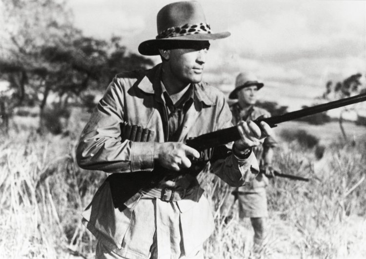 GREGORY PECK in THE SNOWS OF KILIMANJARO (1952), directed by HENRY KING. Copyright 20TH CENTURY FOX.