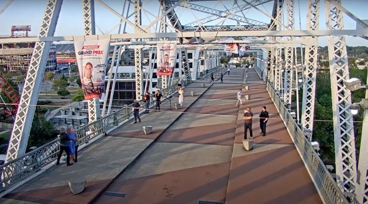 Jon Bon Jovi convinces apparently suicidal woman not to jump from a bridge in dramatic video
