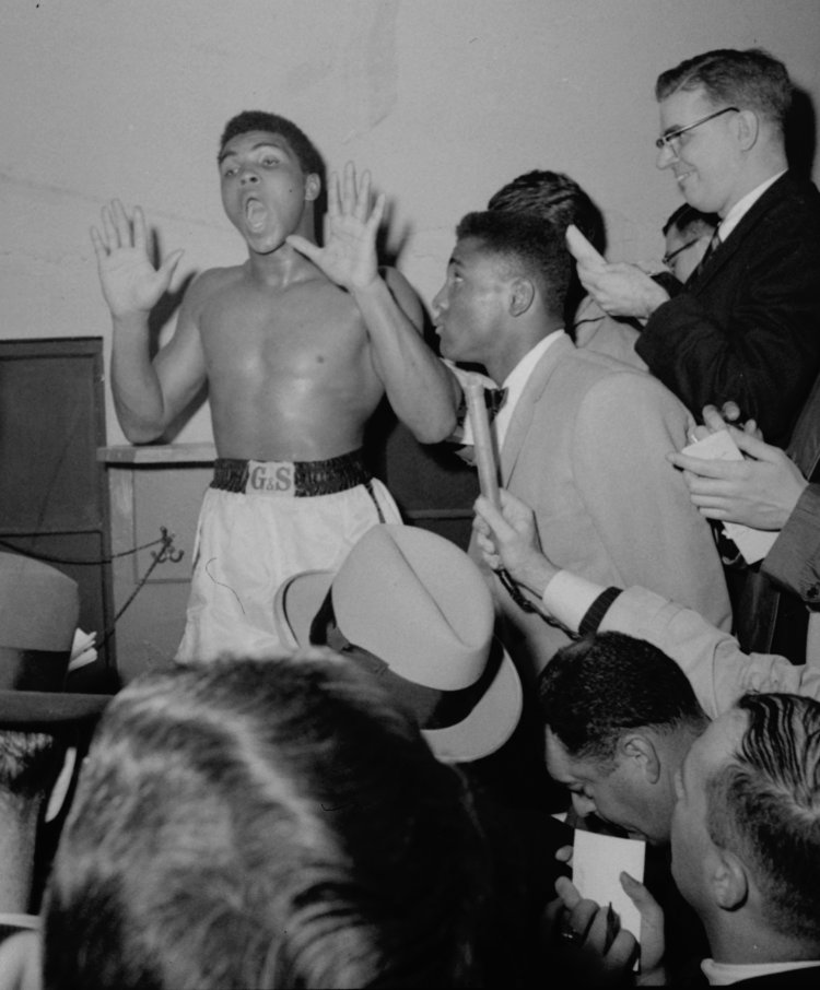A moment during Muhammad Ali's press conference when he was grilled by reporters for his inaccurate round prediction